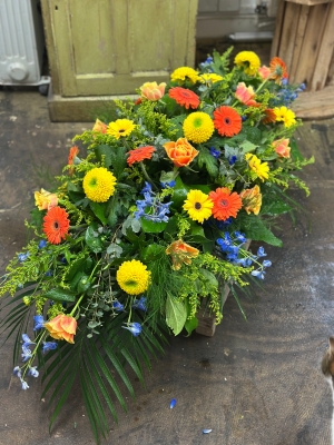 Coffin spray: orange, yellow and blue